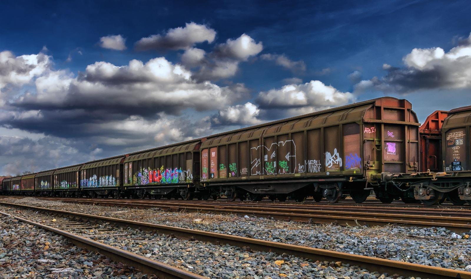 Freight train carrying cargo along the rail line
